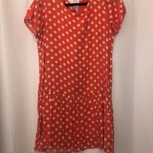 Orange and white polka dotted dress